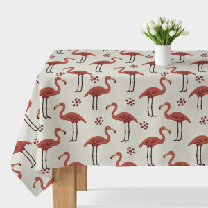 Główne ujęcie obrus z motywem różowych flamingów na kremowym tle na stole