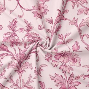Zbliżenie na detal tkaniny i rysunek kwiatów w różowych odcieniach