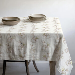 detal tkaniny pokazujący rozmieszczenie zajączków w pastelowych odcieniach