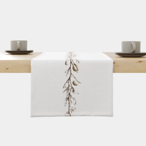 biały bieżnik z pionową linią gałązek bazi i delikatnymi pisankami na środku stołu