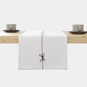 biały bieżnik z pionową linką i pojedynczą fioletową kokardką na środku