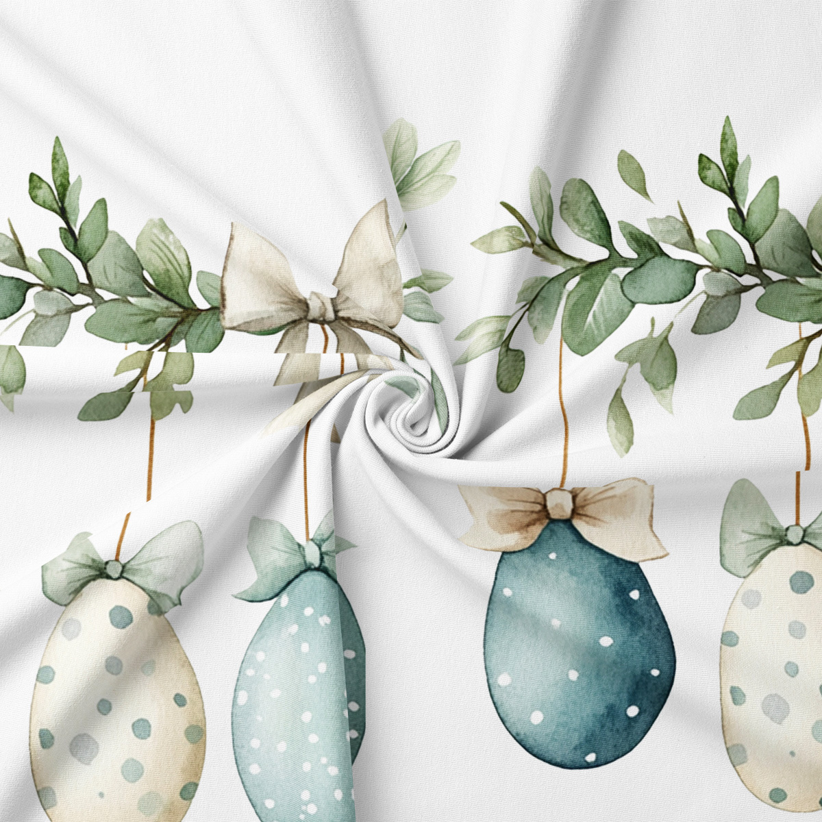 zbliżenie na akwarelowe pisanki, kokardki i fakturę tkaniny