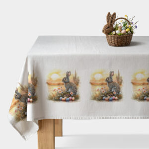 obrus z powtarzalnym motywem zajączka i pisanek na białym tle ustawiony na stole