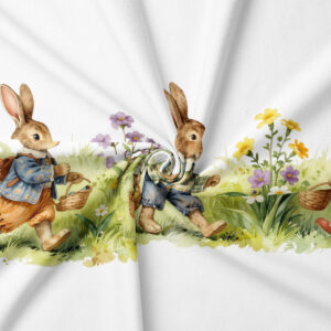 Zbliżenie na nadruk z zajączkami i detal tkaniny, pokazujące teksturę i pastelowe kolory