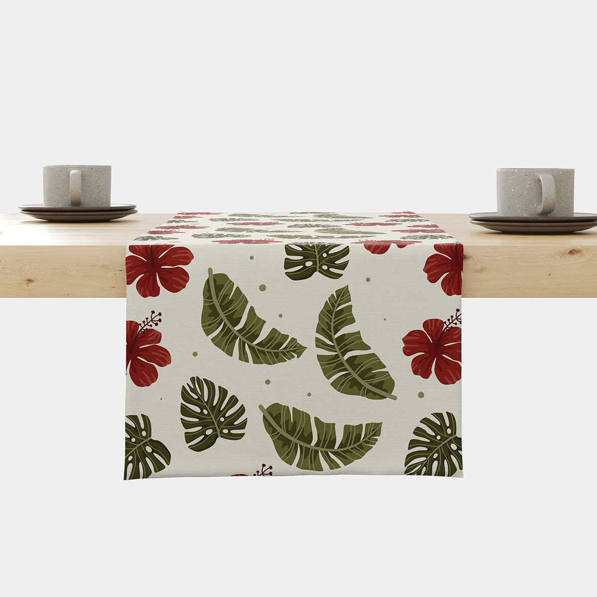 Główne ujęcie bieżnika z motywem zielonych liści i czerwonych hibiskusów na kremowym tle
