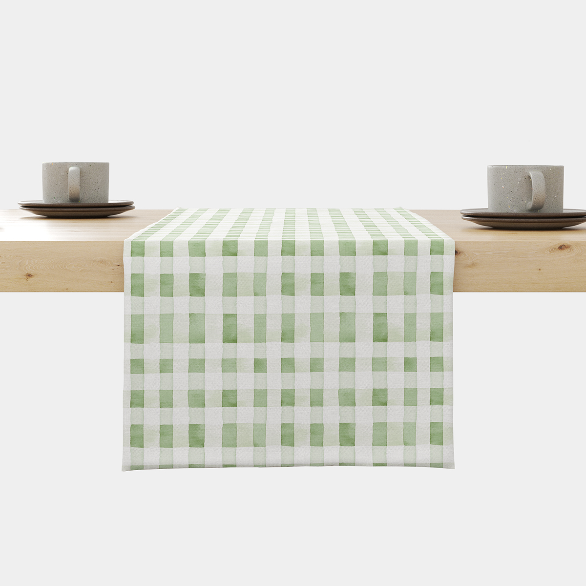 Bieżnik w miętowo-białą kratkę w akwarelowym stylu ułożony na stole