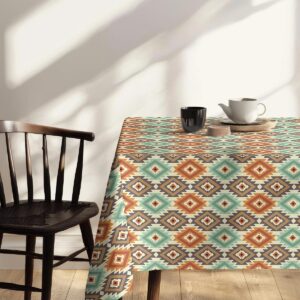 widok blatu z deserami i minimalistyczną porcelaną na geometrycznym obrusie