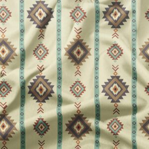 zbliżenie na geometryczne romby i miętowe pasy na tkaninie