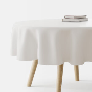 Okrągły biały obrus na stole z książkami, główne ujęcie produktu