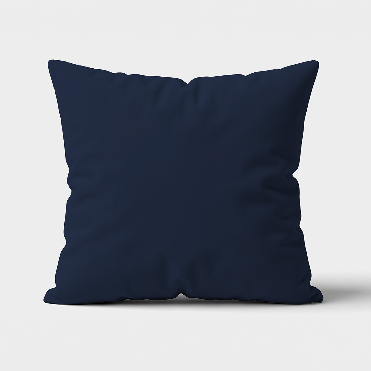gładka granatowa poduszka dekoracyjna na jasnym tle widok z przodu