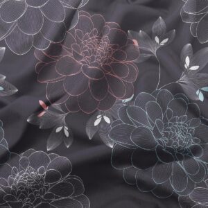 Zbliżenie na tkaninę z cienkimi liniami rysującymi kwiaty i pastelowe akcenty