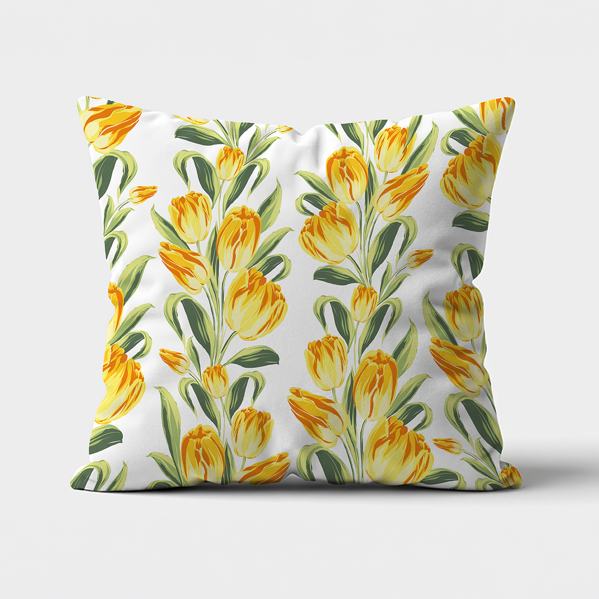 Poduszka z motywem żółtych tulipanów na białym tle, główne ujęcie produktu