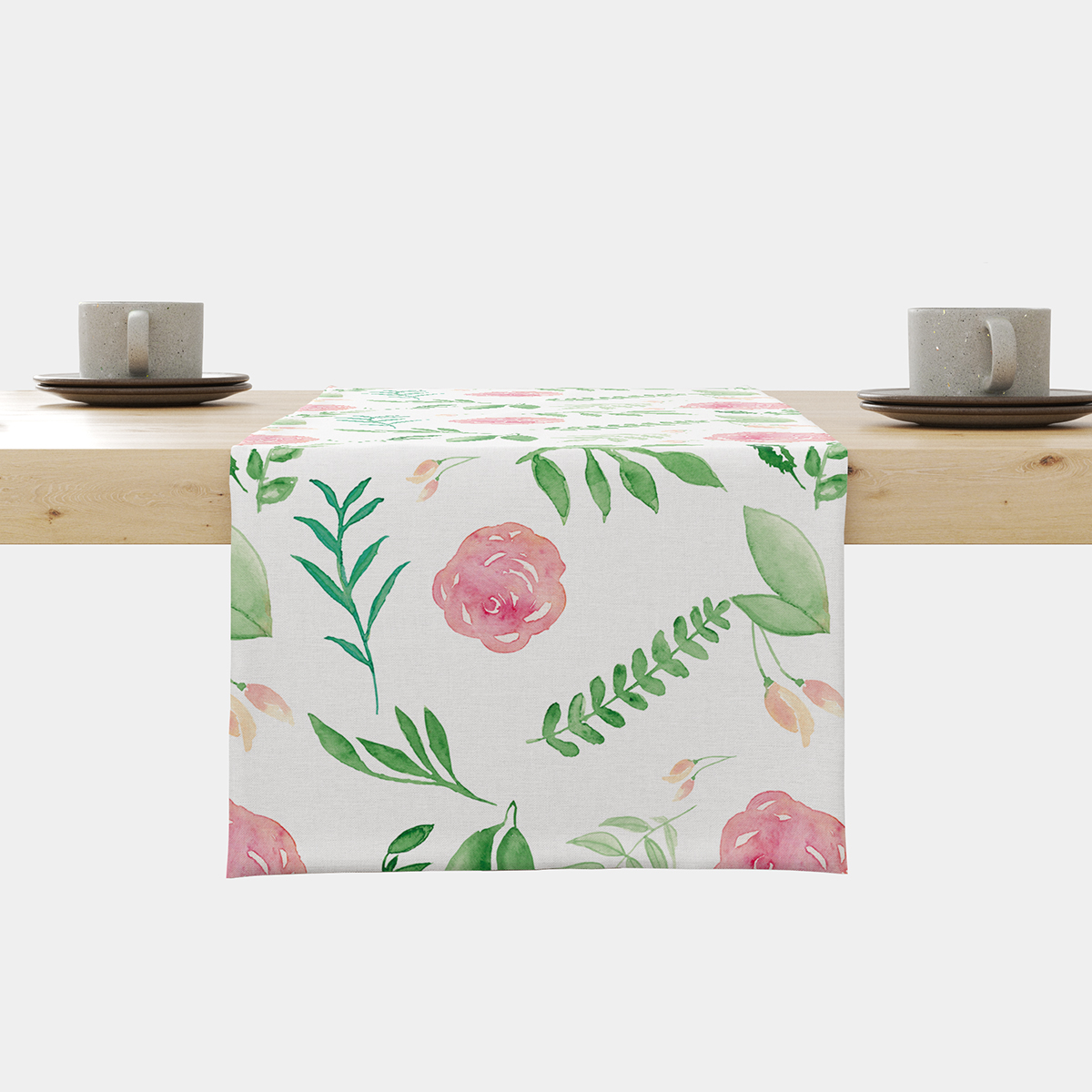 Bieżnik z akwarelowymi różami i listkami rozłożony na stole — widok z przodu
