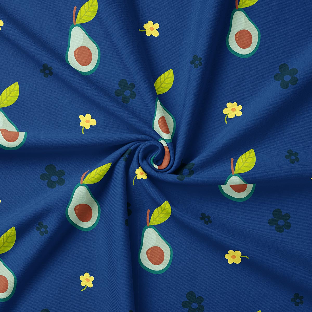 Zbliżenie na tkaninę z nadrukiem połówki awokado i detale liścia