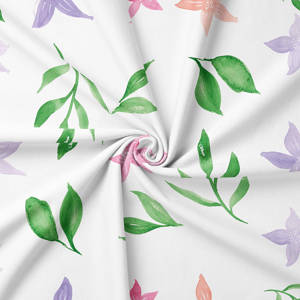 Zbliżenie tkaniny w skręcie, szczegół zielonych listków i akwarelowego nadruku kwiatowego