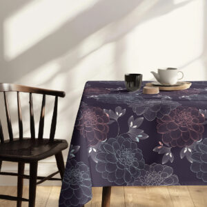 Widok stołu z obrusie prezentujący powtarzalny wzór i elegancką kompozycję dekoracji