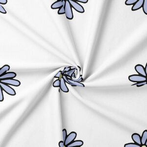 zbliżenie na tkaninę i nadruk stokrotek pokazujące strukturę materiału