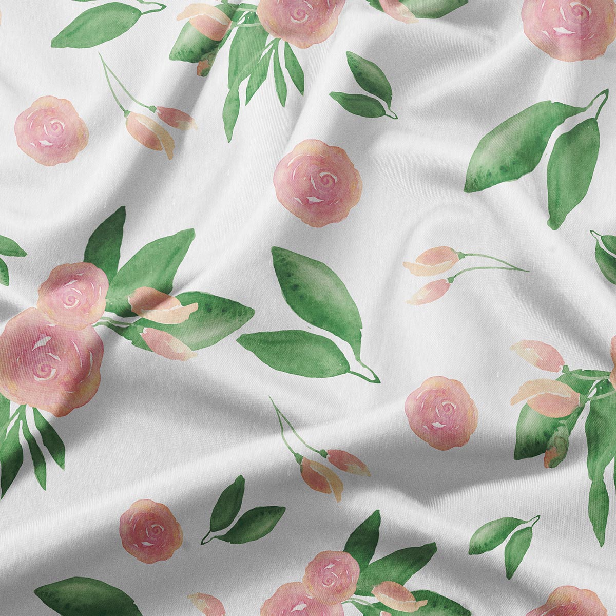 detal tkaniny pokazujący różowe akwarelowe różyczki i liście