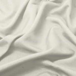 zbliżenie na fakturę kremowej tkaniny obrusa