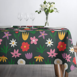 Minimalistyczna aranżacja z kieliszkami i bukietem, kolorowy obrus ożywia wnętrze