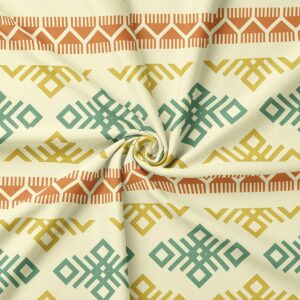 detal tkaniny ze zbliżeniem na miętowe i musztardowe geometryczne motywy