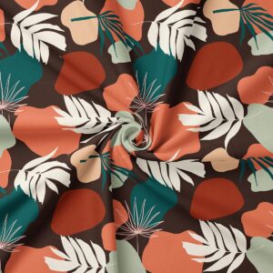 Zbliżenie na wzór i strukturę tkaniny z organicznymi plamami i liśćmi