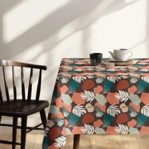 Widok stołu z dekoracjami na tle obrusowego motywu w naturalnej stylizacji