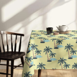 Stół udekorowany obrusem w palmy, kompozycja z krzesłem i miękkim światłem