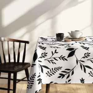 detal tkaniny z powtarzającym się motywem gałązek widoczny na całej powierzchni obrusa