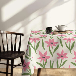 Kąt stołu z krzesłem przy naturalnym świetle podkreślający dekoracyjny motyw obrusa