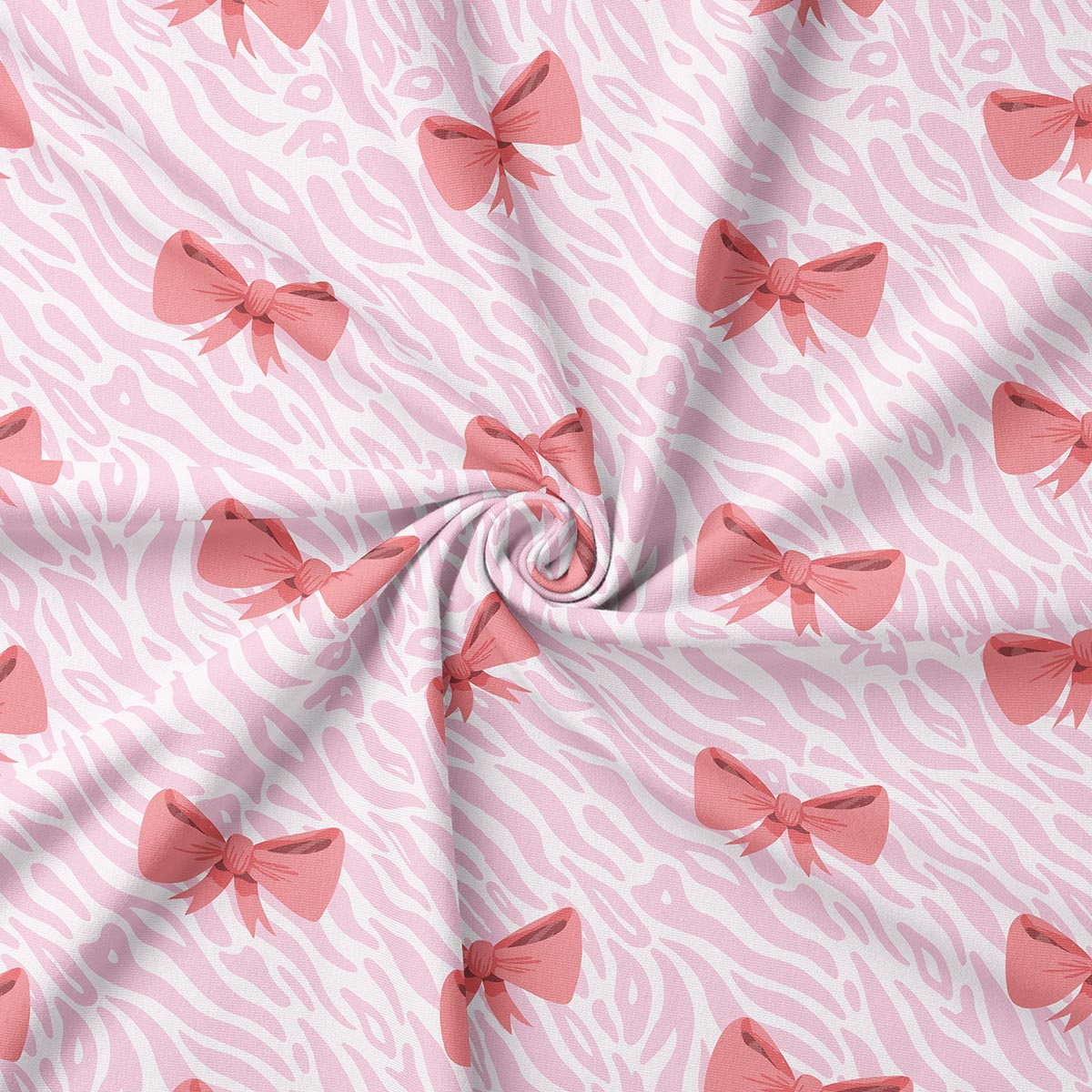 zbliżenie tkaniny z różowymi kokardkami i delikatnym, falistym wzorem