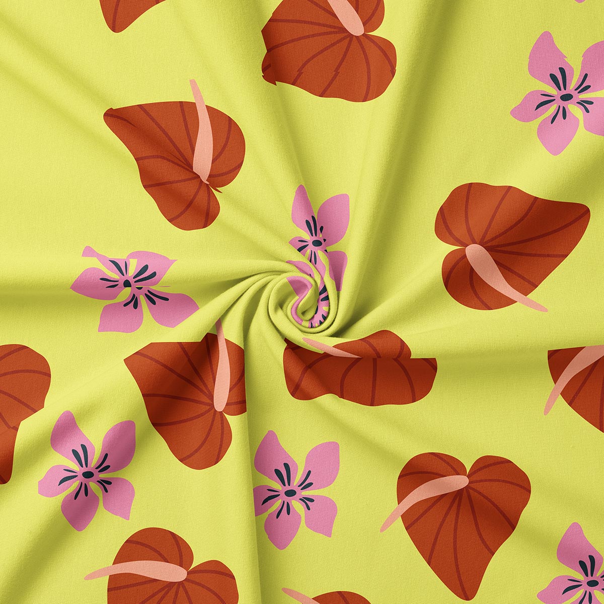 Zbliżenie na strukturę tkaniny z widocznym wzorem liści i kwiatów oraz drobnymi fałdami materiału