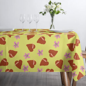 Ujęcie stołu z szerokim rozłożeniem obrusu prezentujące pełny powtarzalny wzór na limonkowym tle