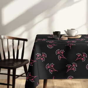 Detal narożnika stołu z widocznym powtarzającym się wzorem gałązek i kropek