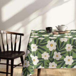 Widok boczny stołu z obrusem, kwiatowy wzór rozciągający się po krawędzi