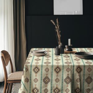 Aranżacja stołu z obrusem i naczyniami w naturalnych, stonowanych kolorach