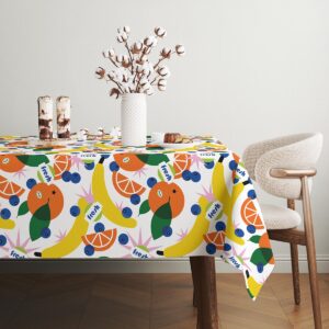 Detal rogu obrusa z widocznym wzorem bananów i fragmentem motywu "fresh"