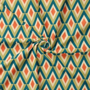 zbliżenie na materiał obrusu pokazujące powtarzalny wzór rombów i fakturę tkaniny