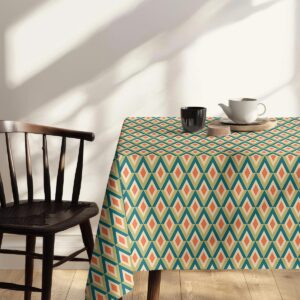 stół udekorowany obrusem w romby z naturalnymi dodatkami w aranżacji