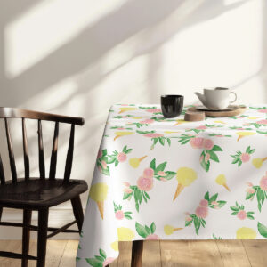 Detale narożnika obrusa z widocznym motywem róż i liści przy krześle