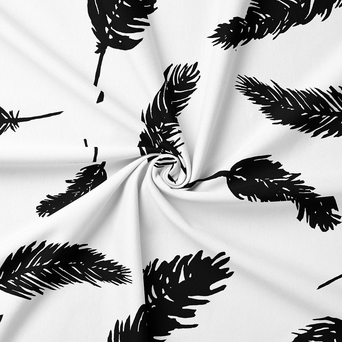 Zbliżenie na nadruk czarnych piór na białej tkaninie pokazujące strukturę materiału