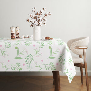 jasne wnętrze z obrus przykrytym delikatnymi gałązkami i elementami dekoracyjnymi