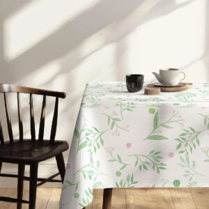 detal narożnika stołu z obrus pokazujący układ gałązek i kropki w pobliżu krzesła