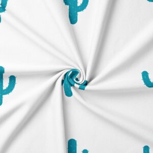 detal tkaniny z turkusowym kaktusem i miękką fakturą materiału