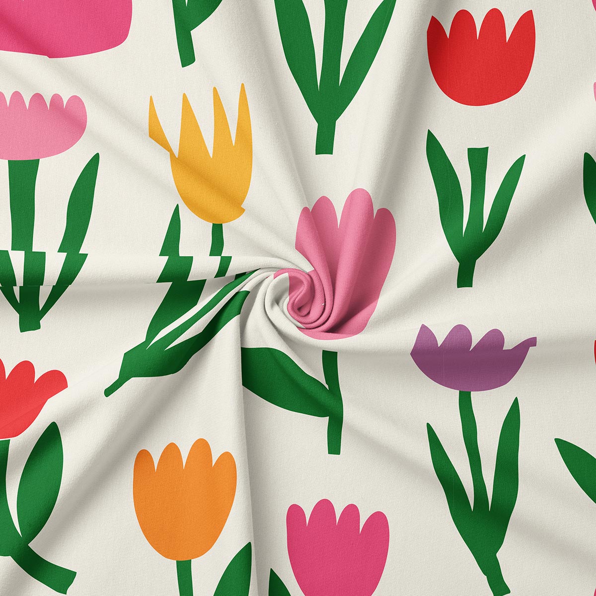 zbliżenie na tkaninę z kolorowymi tulipanami, widoczna faktura materiału