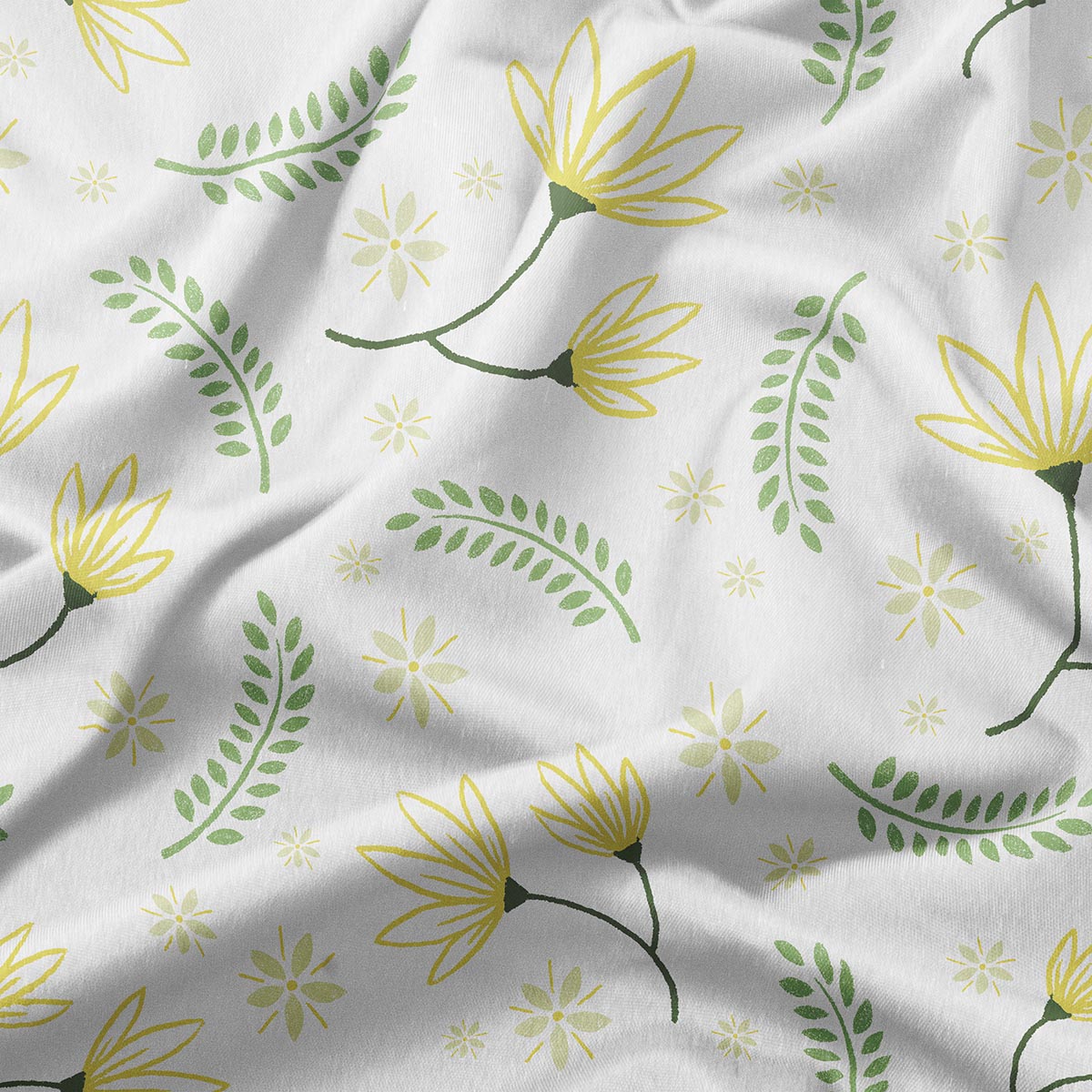 zbliżenie na tkaninę i nadruk delikatnych żółtych kwiatów oraz zielonych listków