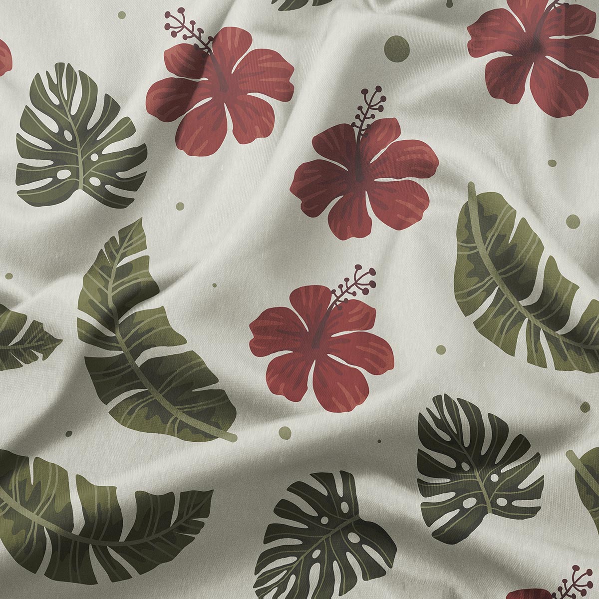 detal tkaniny z wzorem czerwonych kwiatów hibiskusa i tropikalnych liści