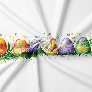 Detal akwarelowych pisanek i zielonej trawy na plamoodpornej tkaninie obrusa