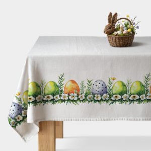 biały obrus z akwarelowym pasem pisanek i kwiatów na stole — główne ujęcie