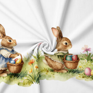 zbliżenie na materiał z nadrukiem zajączka z koszykiem i kwiatami